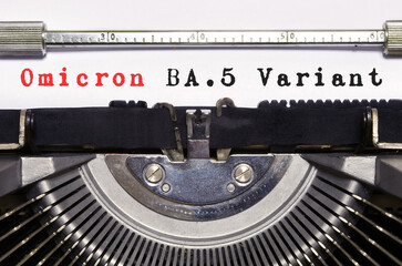 Covid-19 new Omicron BA.5  Variant. Conceptual words 'Omicron BA.5 Variant' typed on vintage typewriter. Omicron (BA.5): SARS-CoV-2 Variant of Concern