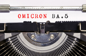 Covid-19 new Omicron BA.5  Variant. Conceptual words 'Omicron BA.5' typed on vintage typewriter. Omicron (BA.5): SARS-CoV-2 Variant of Concern
