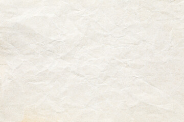 beige crumpled paper background texture macro closeup