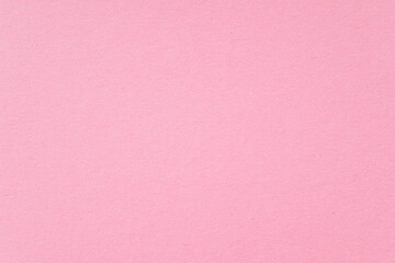 Smooth pink paper cardboard as texture, background, top view space for text