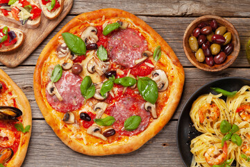 Italian cuisine. Pizza, pasta and toasts