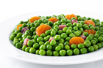 Green peas with serrano ham and carrot isolated on white background	