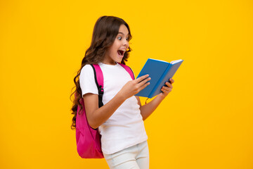 Amazed teen girl. School teenager child girl with school backpack hold book and copybook. Teenager student, isolated background. Learning and knowledge. Go study. Excited expression.