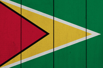 Patriotic wooden plank background in colors of flag. Guyana
