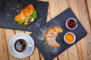 croissant with butter and jam