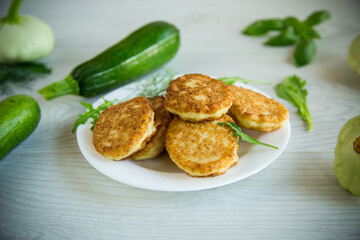 fried vegetable pancakes from squash and zucchini with herbs