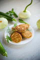 fried vegetable pancakes from squash and zucchini with herbs