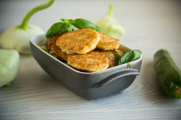 fried vegetable pancakes from squash and zucchini with herbs