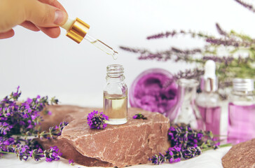 Essential oil with lavender extract. Selective focus.