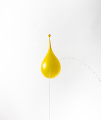 punctured water balloon leaking