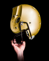 Hand holding up a blank helmet