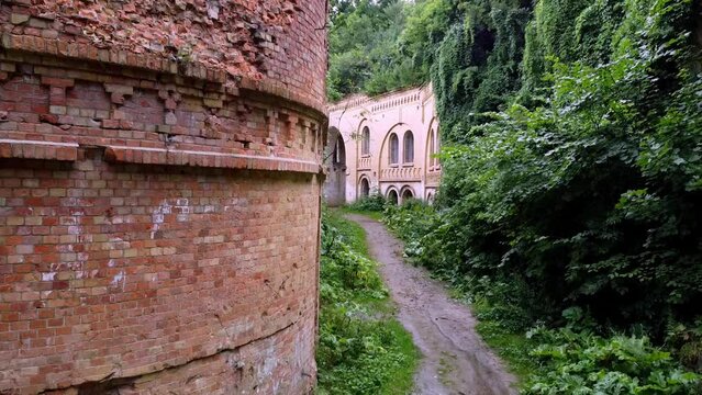Brick wall and trees in Tarakaniv fortress in Ukraine