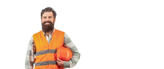 Bearded man worker in building helmet or hard hat. Portrait of a builder smiling. Worker in construction uniform. Man builders, industry - obrazy, fototapety, plakaty