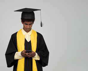 Teenager boy afro graduated isolated holding cell