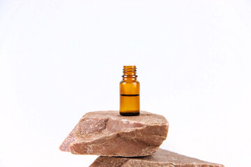 Essential oil on the stone. Selective focus.