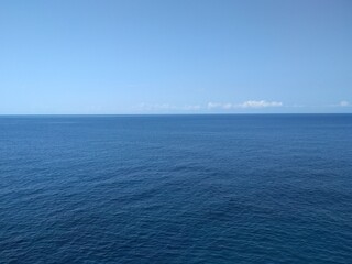 Blue sea under the blue sky