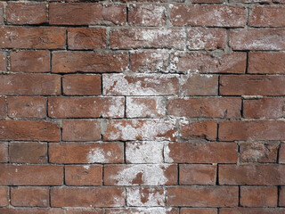 efflorescence on brick wall