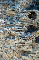Natural rocks with porous texture abstract background