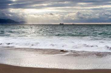Sunset at Azkorri beach in the coast of Biscay, Basque Country, north of Spain. 
