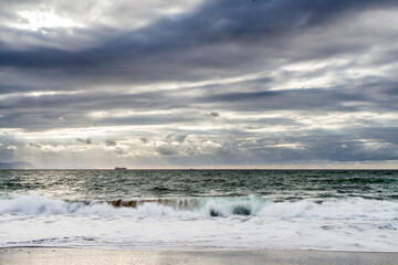 Sunset at Azkorri beach in the coast of Biscay, Basque Country, north of Spain. 