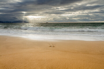 Sunset at Azkorri beach in the coast of Biscay, Basque Country, north of Spain. 