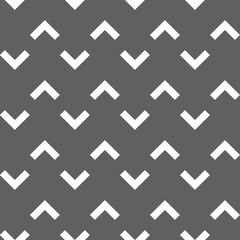 Vector. Grey and white abstract ethnic seamless pattern. Background of angle brackets. Mosaic. Design of packaging paper, textile printing, web design, cover, advertising and typographic products.