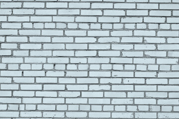 Brick wall with unusual blue bricks made of whole blue bricks and broken blue bricks for an abstract blue background