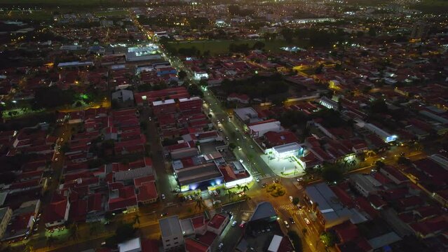 Aerial image of the city of Pirassununga, in the interior of S&atilde;o Paulo, in the Vila Brasil neighborhood, with a view of the sunset and night image of the city