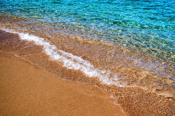 Turquoise clear water in sea and sandy beach
