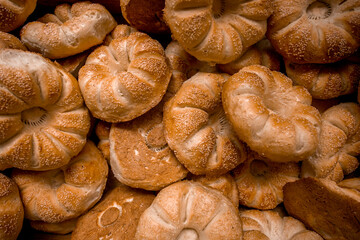 The small bread of Tashkent. They taste delicious because the batter is mixed with milk.
