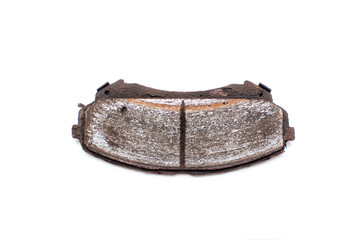 Very worn out brake pads threatening road safety isolated on white background.