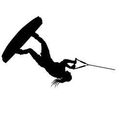 A vector silhouette of a girl wakeboarding doing a flip or trick.