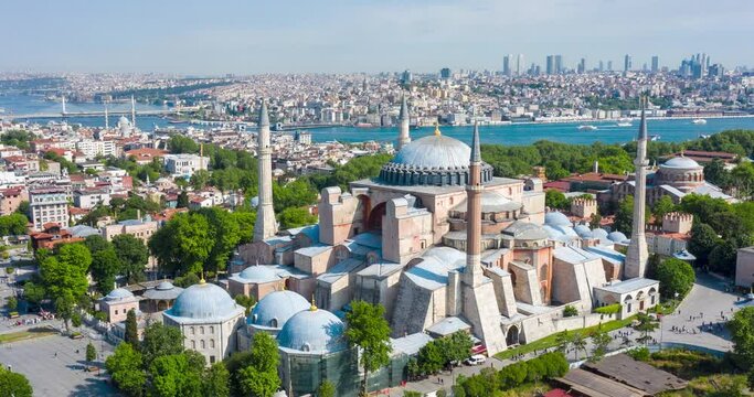 Aerial view, Hyperlapse of Ayasofya (Hagia Sophia) Mosque, Istanbul, Turkey. Downtown from above at sunny day. European side, Motion drone Time Lapse