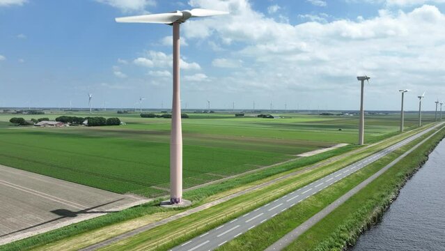 Generation Of Wind Energy Through Wind Turbine Systems. Green Sustainable Alternative Electricity Generation Using Wind Mills Reducing Carbon Footprint And Green House Gas Emissions.