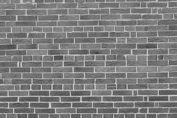 Fototapeta na wymiar Black and white background with brick wall texture