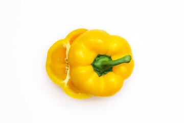 Yellow pepper in a cut on a white background. Close-up