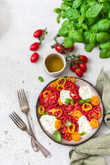 Salad with tomato, Bell pepper , basil and burrata cheese