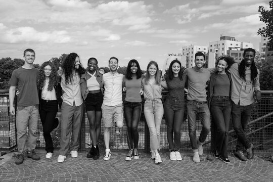Group of friends of different nationalities together - black and white photo