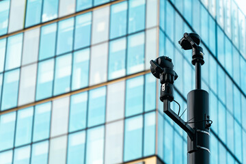CCTV cameras monitoring a downtown highrise city