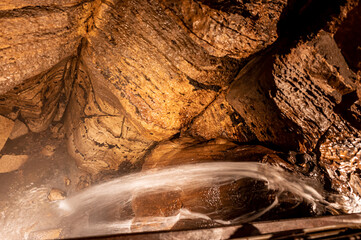 Flowing waterfall underground in Niagara Cave, MN