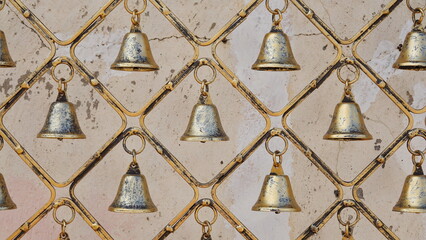 Shabby Antique Fence. Bells Pattern. Rusty Texture of Bronze or Copper.Vintage grunge Photo