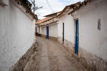 Fototapeta na wymiar Street of stones in the day near the main square in Cusco, Peru