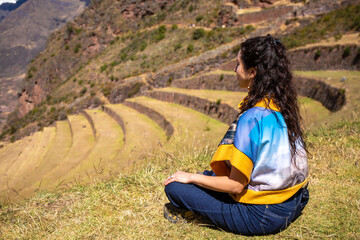 Woman on farming terraces at Inca ruins at Pisac in the Sacred Valley in Cusco, Peru - obrazy, fototapety, plakaty
