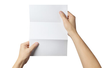 Hands holding a folded sheet of white paper, isolated on white background
