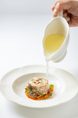 fish ear with broth on a white background
