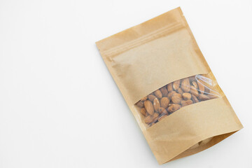 Almond in a package on a white background