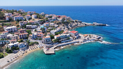Naklejka na ściany i meble Aerial drone photo of famous small picturesque vilalge of Armenistis in island of Ikaria, Northeast aegean, Greece