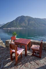 Outdoor restaurant with sea and mountain view in Europe, Montenegro