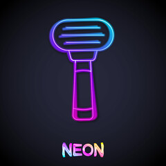 Glowing neon line Shaving razor icon isolated on black background. Vector
