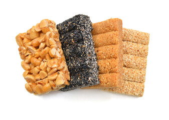 Honey bars with peanuts, sesame and sunflower seeds isolated